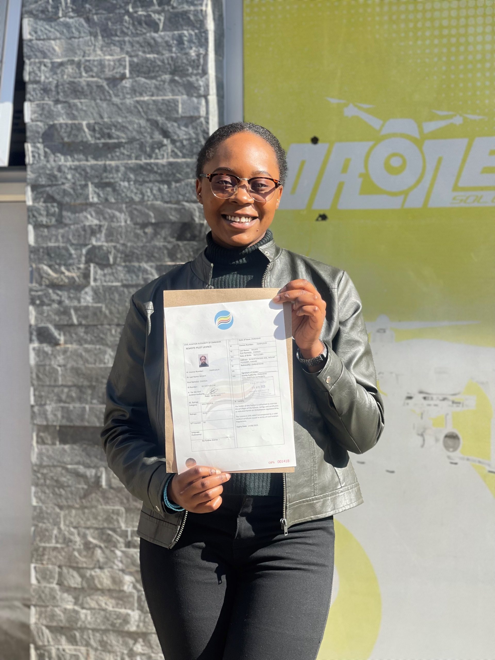 Drone University graduate holding a remote pilot licence